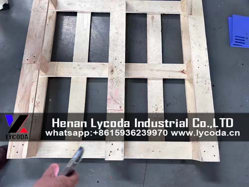 Customer is testing wood pallet making machine on spot